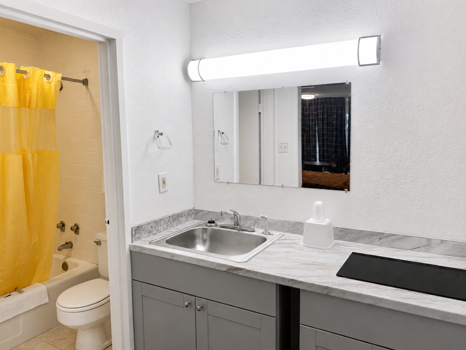 Studio Lodge of Columbus bathroom and vanity