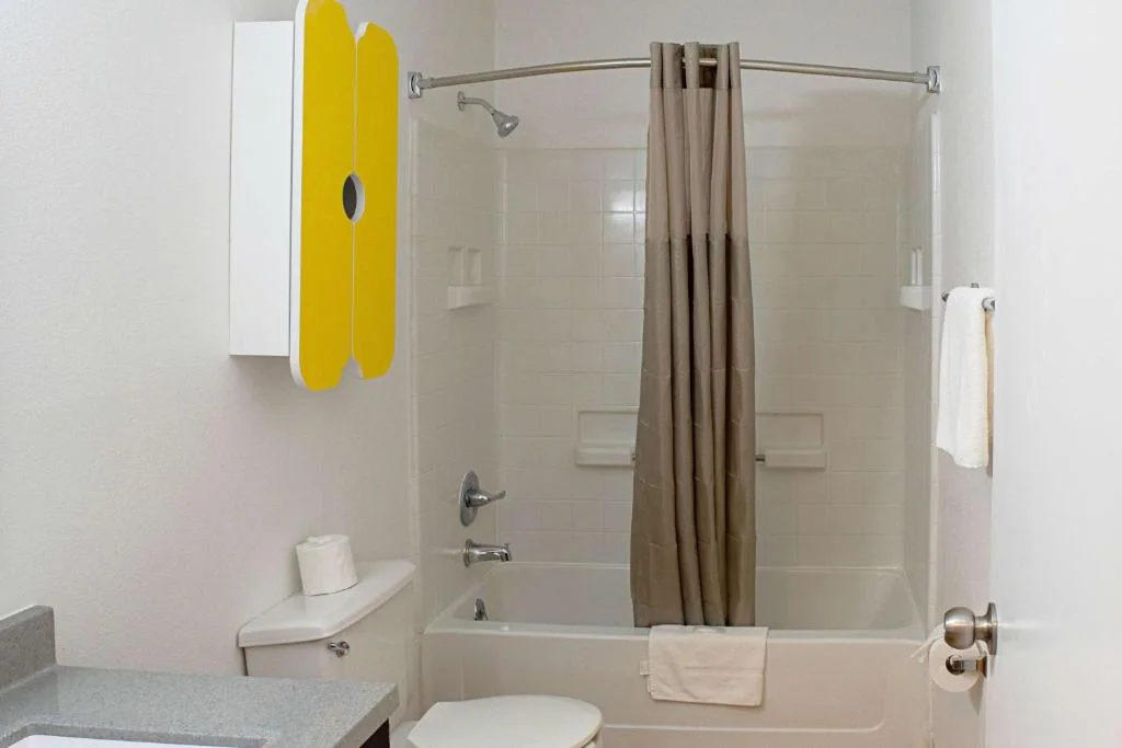 Springdale guest bathroom with shower and tub
