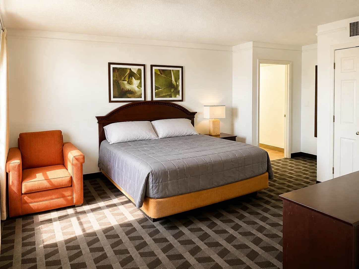 Montgomery suite with king bed and sitting chair