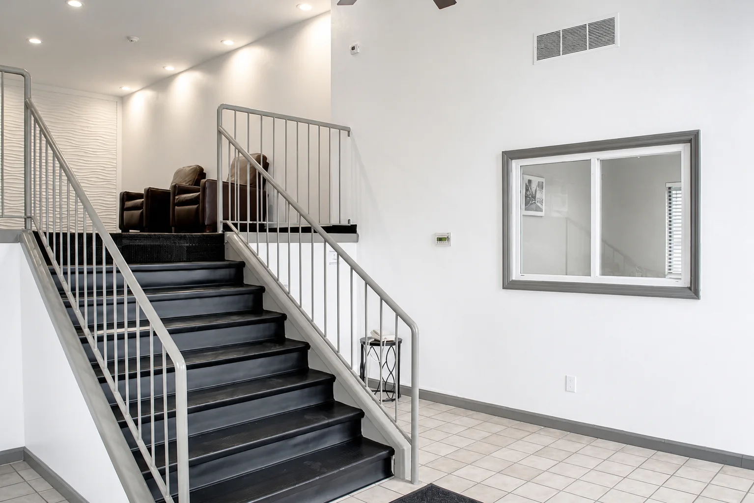 Springdale lobby stairs and seating area