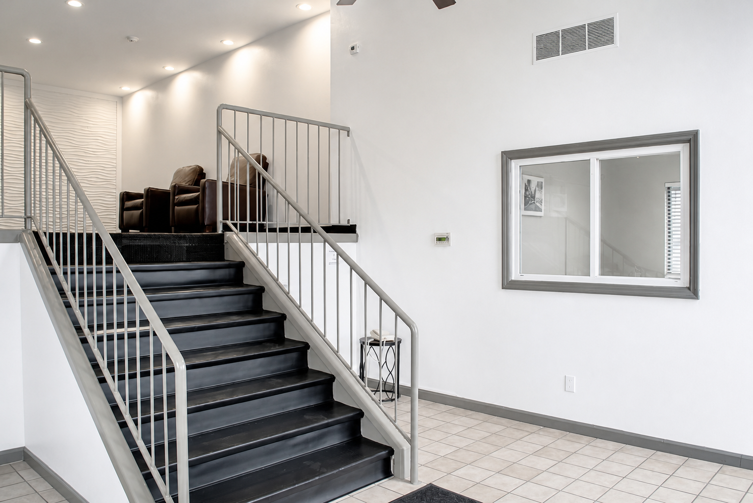 Springdale lobby stairs and seating area