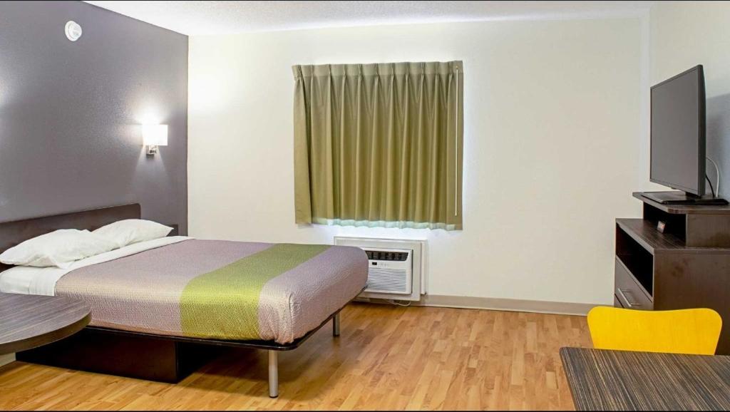Springdale queen room with window air conditioner